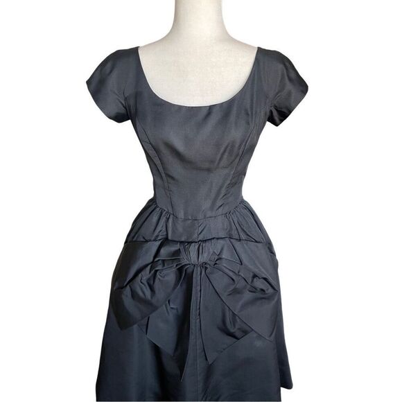 Vintage Gus Mayer 60s black cocktail flared out bow front cocktail dress - Picture 3 of 10